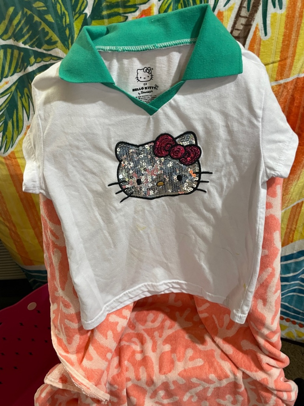 Hello Kitty White Polo with Green Collar and Pink Sequin Bow